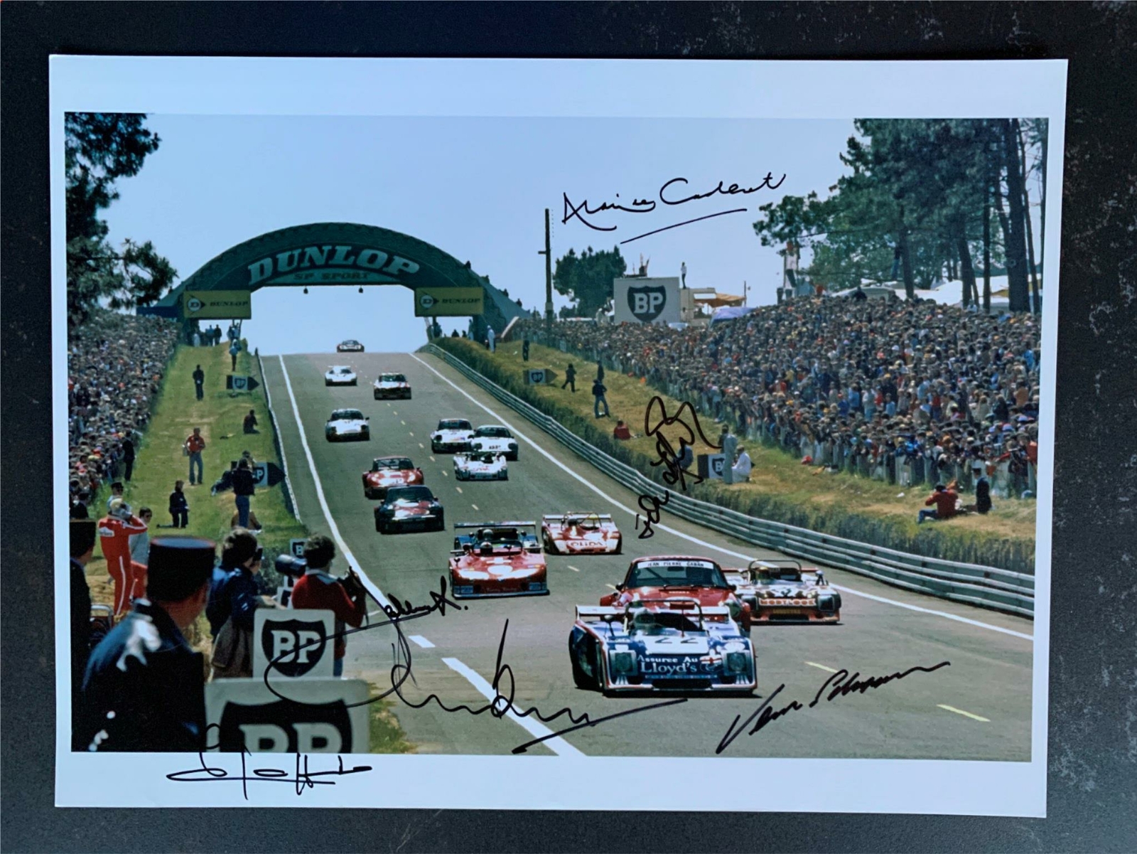 LAT 16X12 photo Le Mans 1977 Dunlop multi signed incl race winner Jacky Ickx