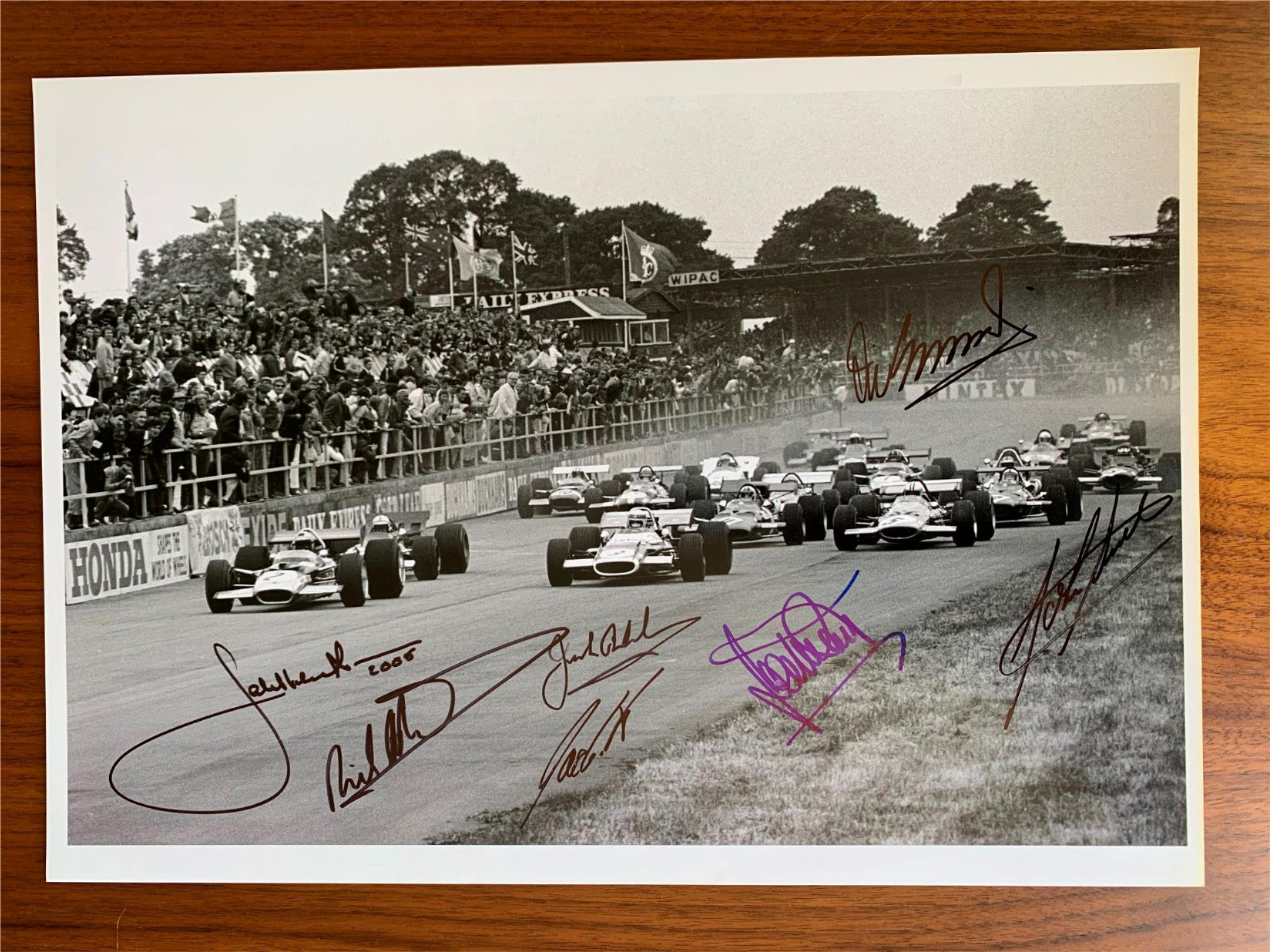 Sutton 16x12 photo British GP 1969 signed Stewart Ickx Elford Oliver Brabham +F1